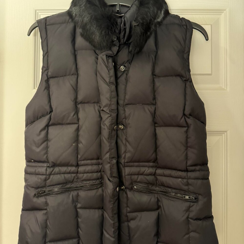 Black puffer vest with faux fur collar